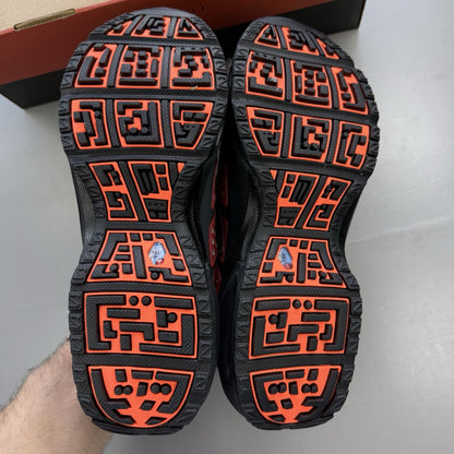 Nike black trainers with Hyper Crimson accents and Gore-Tex material.