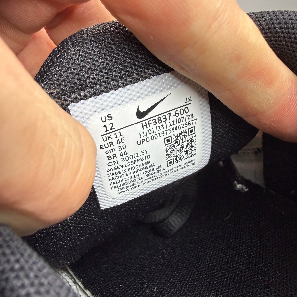 Nike Air Max Plus TN pink trainers with sunset gradient and signature swoosh logo.