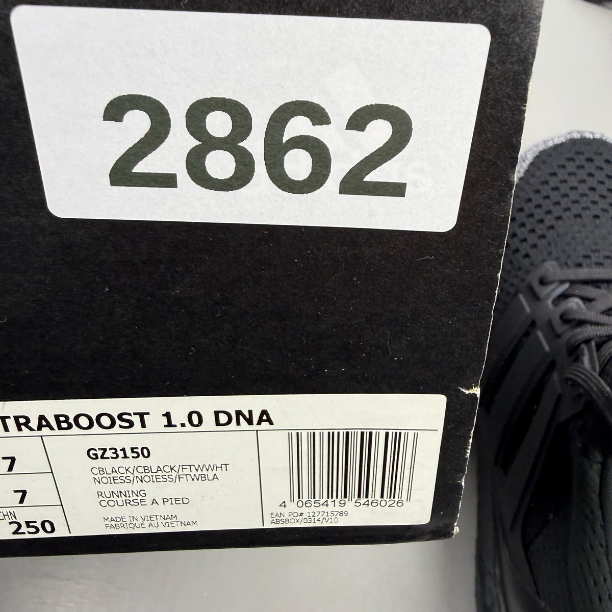 Adidas black Ultra Boost 1.0 trainers with core black and oreo toe design.