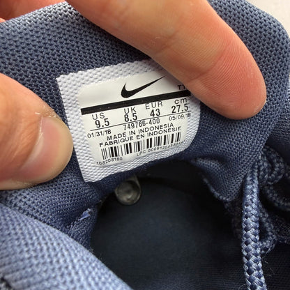Nike Air Max 95 blue trainers with midnight navy accents and signature logo details.
