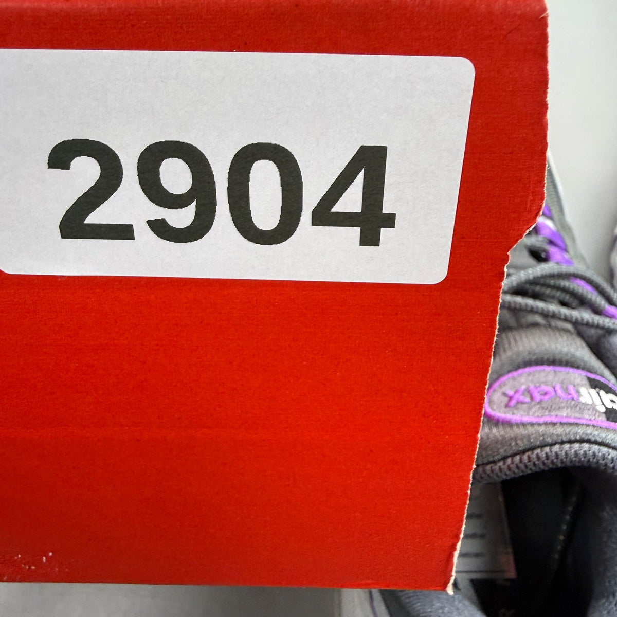 Nike Air Max 95 grey trainers with big bubble sole and logo detailing.