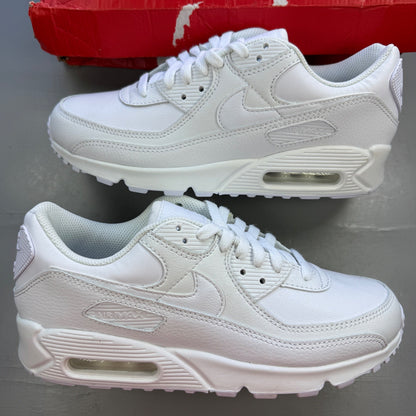 Nike deck shoes white leather with logo and minimalist design.