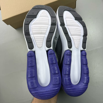Nike Air Max 270 white trainers with Persian Violet accents and logo detail.