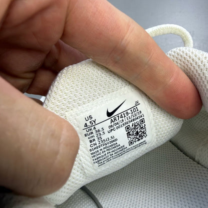 Nike Air Max Oketo white trainers with bubble pack design and logo detail.