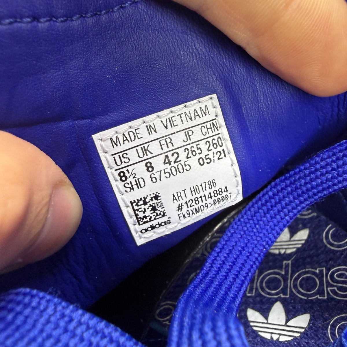 Adidas blue deck shoes suede upper with white logo and gum sole.