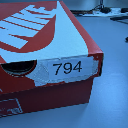 Nike Air Max Plus TN Ultra white trainers with reflective accents and signature swoosh logo.