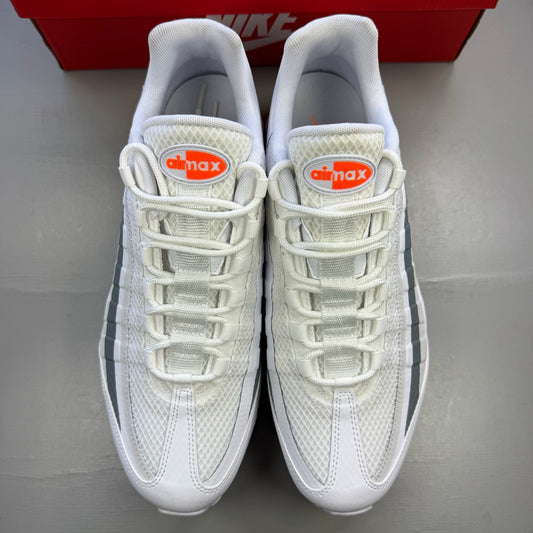 Nike Air Max 95 white trainers with grey accents and distinctive air cushioning design.