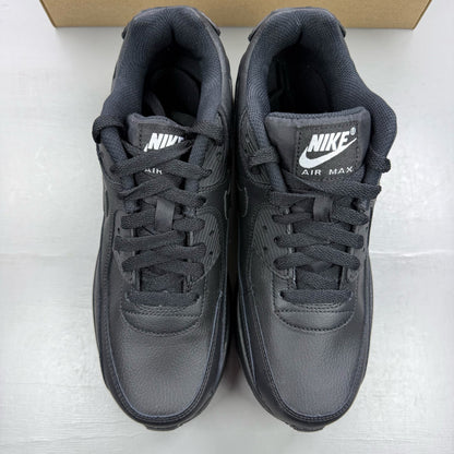 Nike Air Max 90 black leather trainers with iconic swoosh logo and textured design.