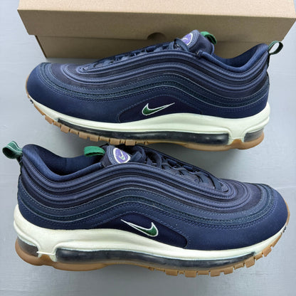 Nike Air Max 97 blue trainers with obsidian and gorge green accents, mesh and leather material.