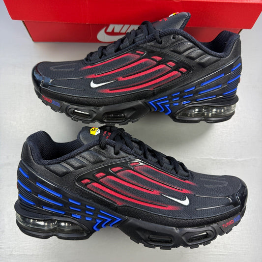 Nike trainers black with Spider-Man graphic and Air Max Plus TN design.