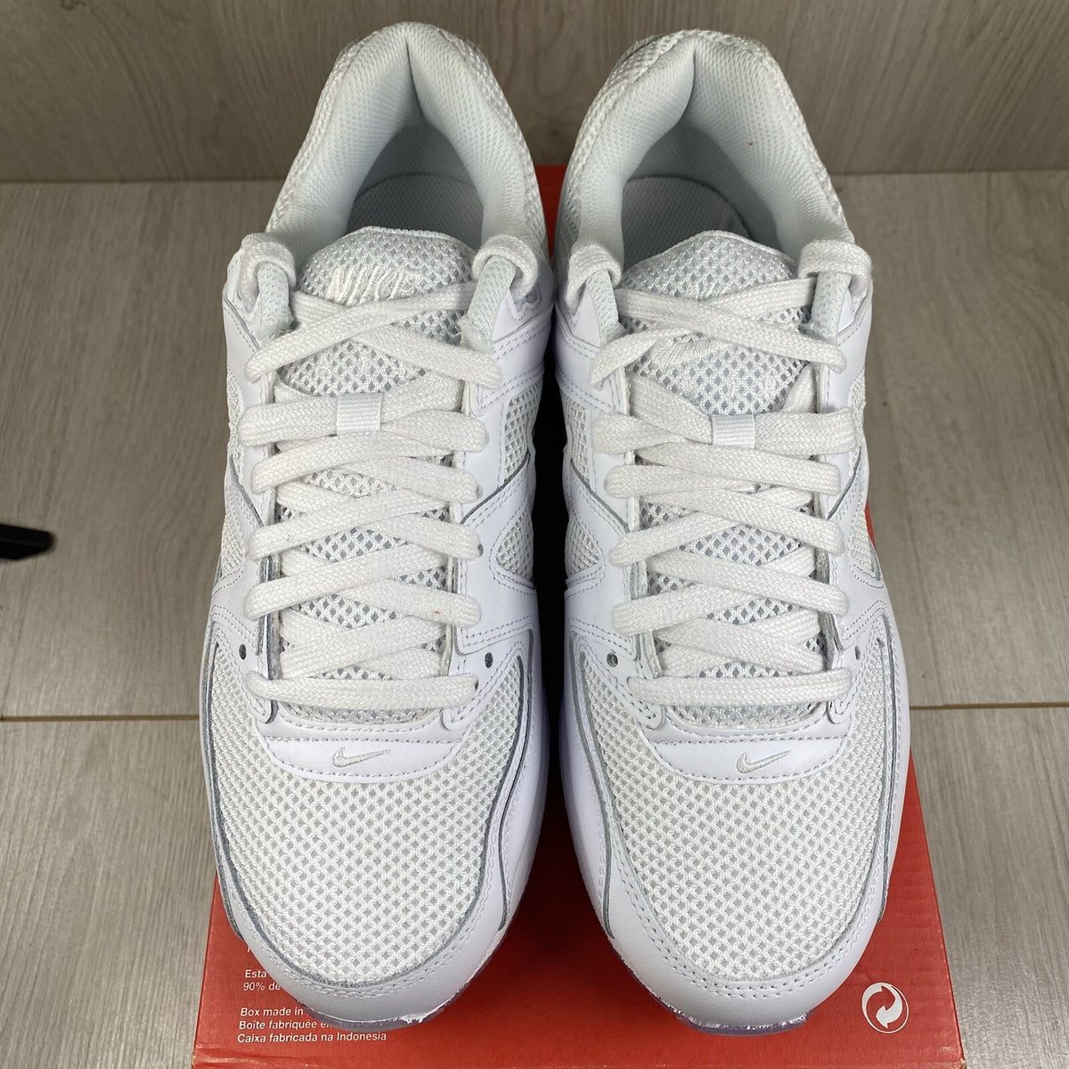 Nike Air Max Command trainers white with mesh upper and signature swoosh logo.