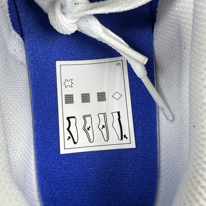 Nike trainers game royal blue with white and black accents, featuring logo detail.