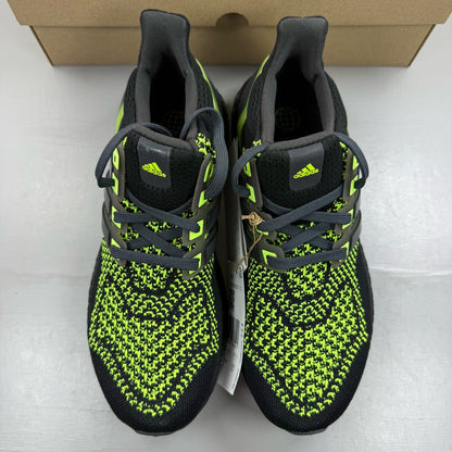 Adidas black Ultraboost 1.0 trainers with Lucid Lemon accents and breathable mesh upper.