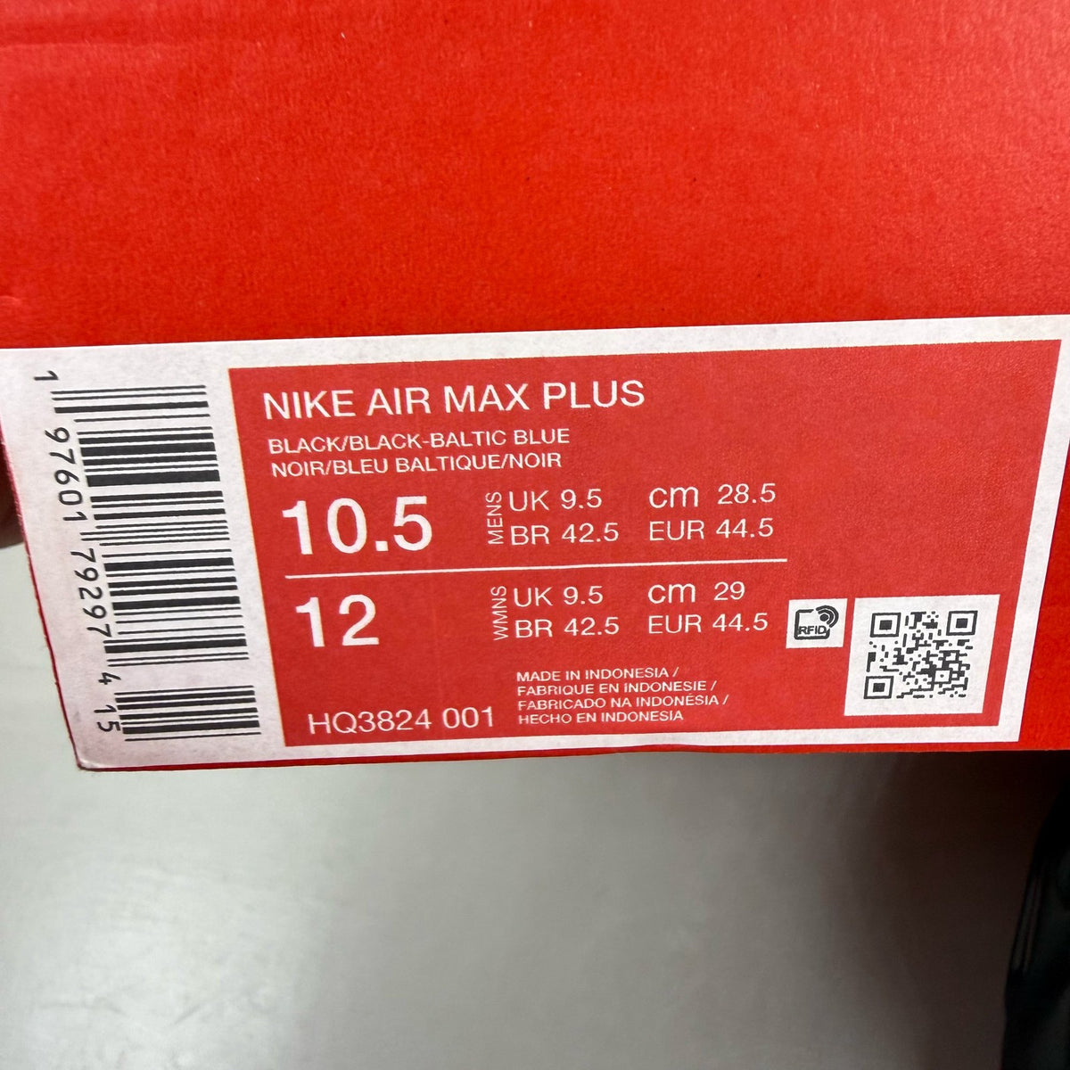 Nike Air Max Plus TN blue trainers with shark attack pattern and iconic swoosh logo.