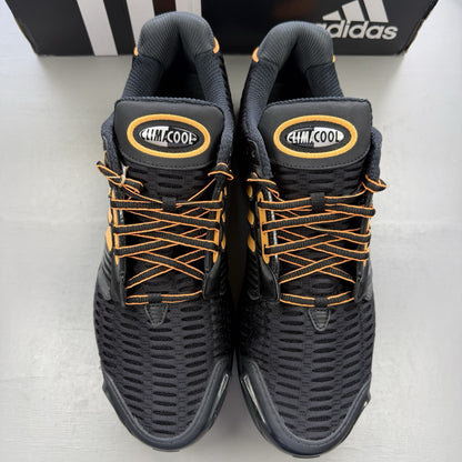 Adidas black trainers with flash orange accents and Climacool ventilation design.
