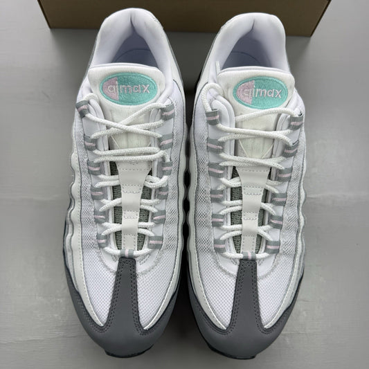 Nike Air Max 95 trainers white with turquoise and pink accents, big bubble design.