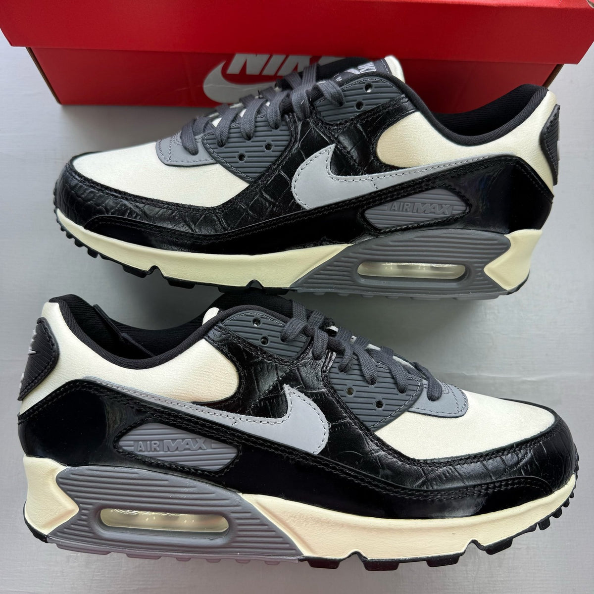 Nike black trainers with crocodile pattern and logo, size UK 8, brand new.