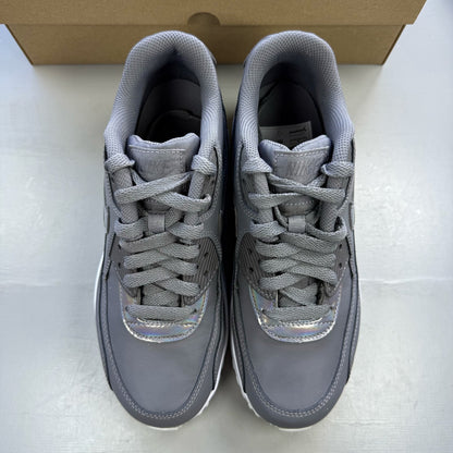Nike Air Max 90 grey trainers with white accents and logo detail.