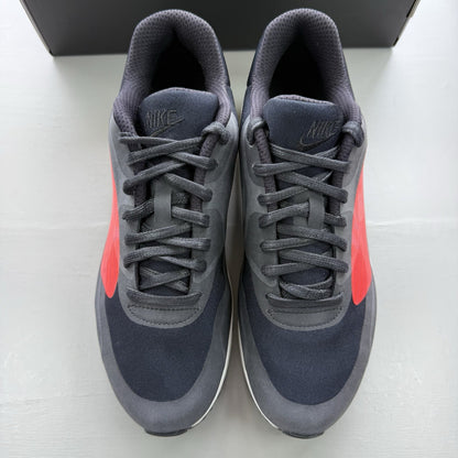 Nike Air Max 90 trainers black with crimson and white big logo design.