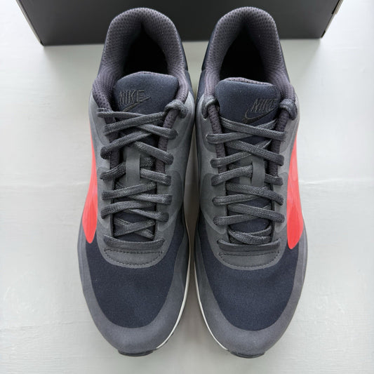 Nike Air Max 90 trainers black with crimson and white big logo design.