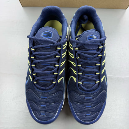 Nike Air Max Plus TN blue trainers with yellow accents and signature swoosh logo.
