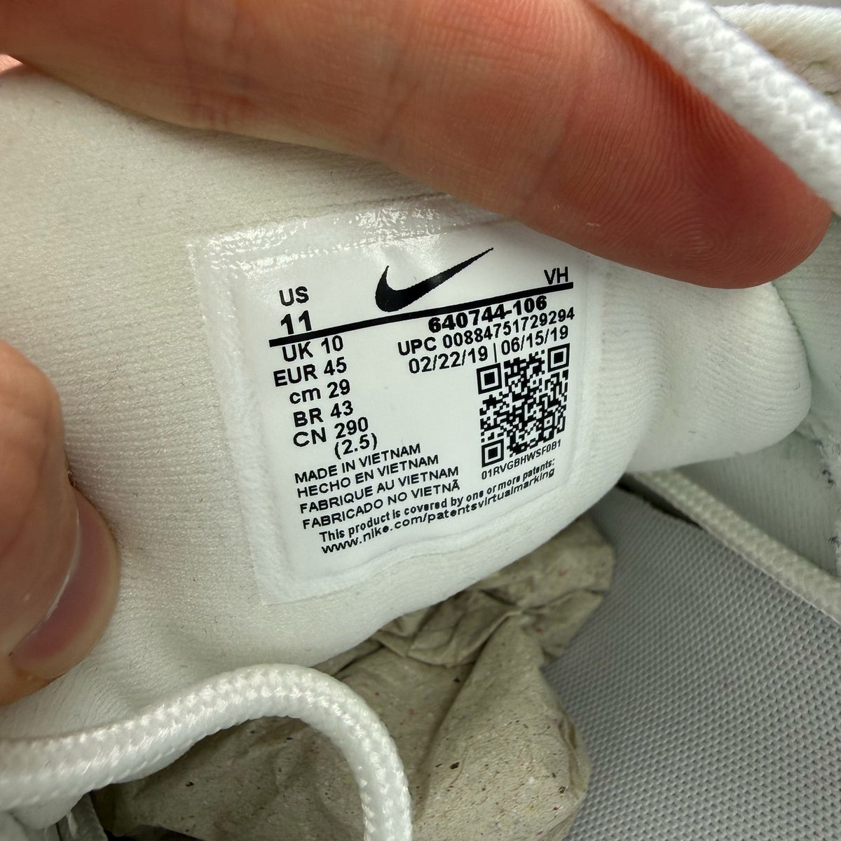 Nike Air Max 98 white trainers with platinum accents and signature swoosh logo.