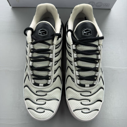 Nike Air Max Plus TN white trainers with black and purple accents, custom writing on bubbles.