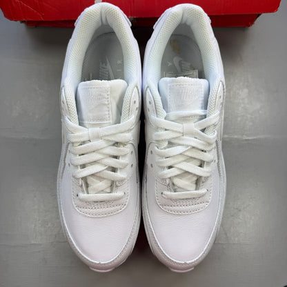 Nike deck shoes white leather with logo and minimalist design.