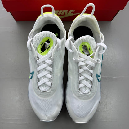 Nike white trainers with aquamarine and lime glow accents, featuring iconic logo details.