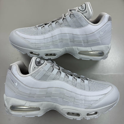Nike Air Max 95 white trainers with big bubble sole and reflective detailing.
