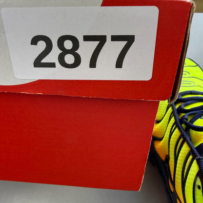 Nike Air Max Plus trainers yellow with Hyper Crimson accents and iconic TN logo.