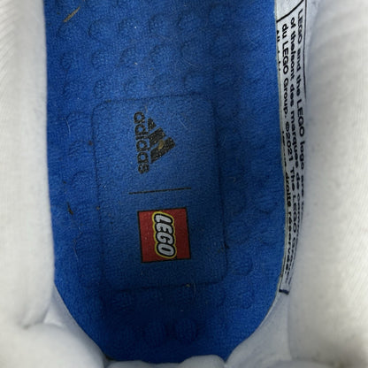 Adidas grey Ultra Boost trainers with blue accents and distinctive LEGO branding.