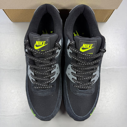 Nike running shoes black with volt accents and mini swoosh logo.