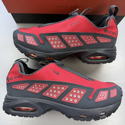 Nike black trainers with Hyper Crimson accents and Gore-Tex material.