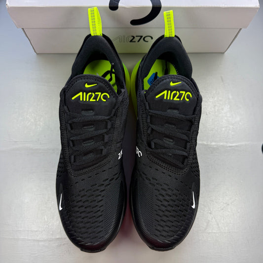 Nike deck shoes black with neon volt green accents and white detailing.
