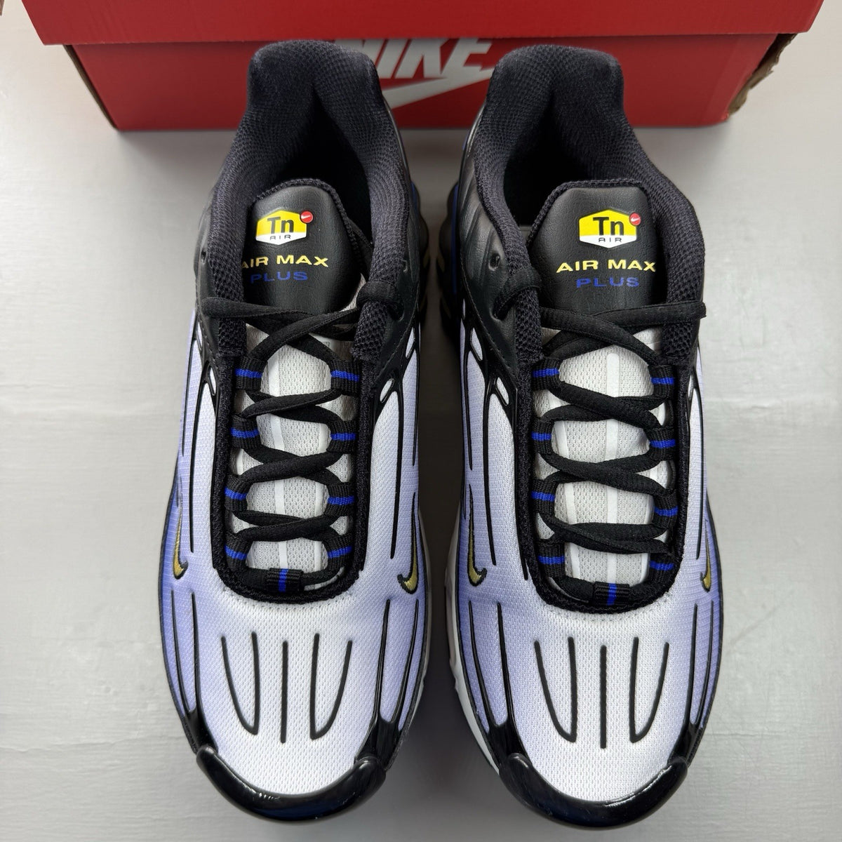 Nike Air Max Plus TN 3 blue trainers with black and white accents, logo on tongue.