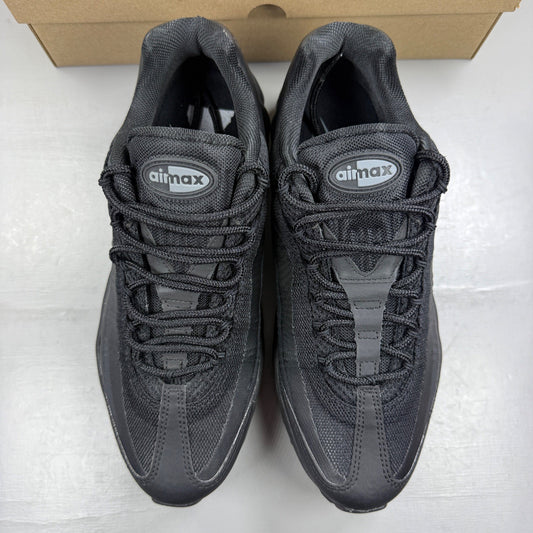 Nike deck shoes black with grey accents and signature swoosh logo.