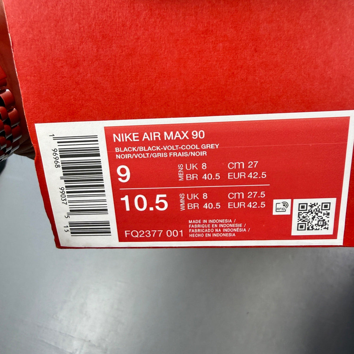 Nike Air Max 90 black with volt accents and mini swoosh logo, brand new condition.