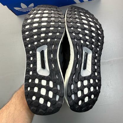 Adidas Ultra Boost 4.0 black running trainers with white accents and logo detail.