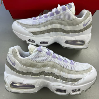 Nike Air Max 95 OG Big Bubble white trainers with hydrangea pattern and logo details.