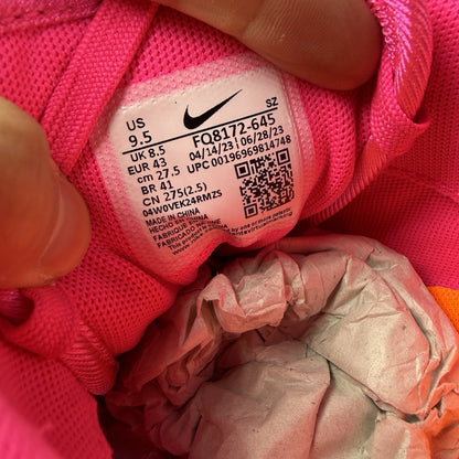 Nike Air Max 1 PRM trainers pink with Día De Muertos pattern and white accents.