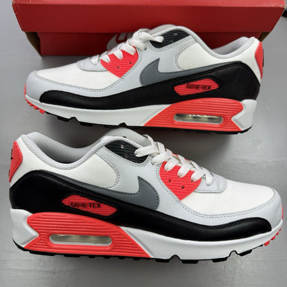 Nike Air Max 90 trainers white Gore-Tex with infrared accents and logo detail.
