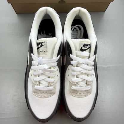Nike Air Max 90 white trainers with obsidian and pewter accents, featuring logo detail.