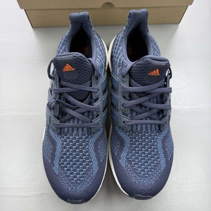 Adidas Ultra Boost 5.0 DNA trainers in navy blue with white accents and logo.