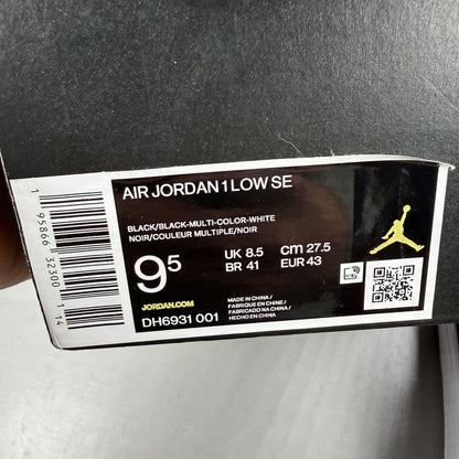 Jordan black athletic shoes with white accents and diamond pattern details.