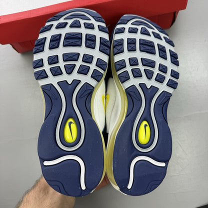 Nike Air Max 97 dark blue trainers with opti yellow and white accents, logo detail.