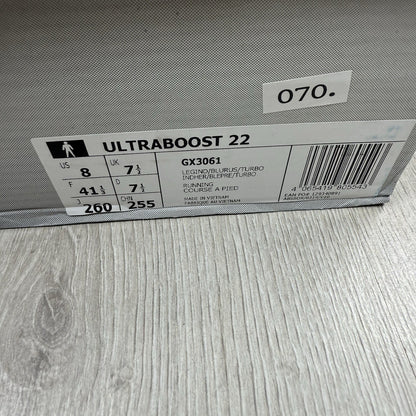 Adidas Ultra Boost 22 trainers in legacy indigo with turbo blue and white accents.