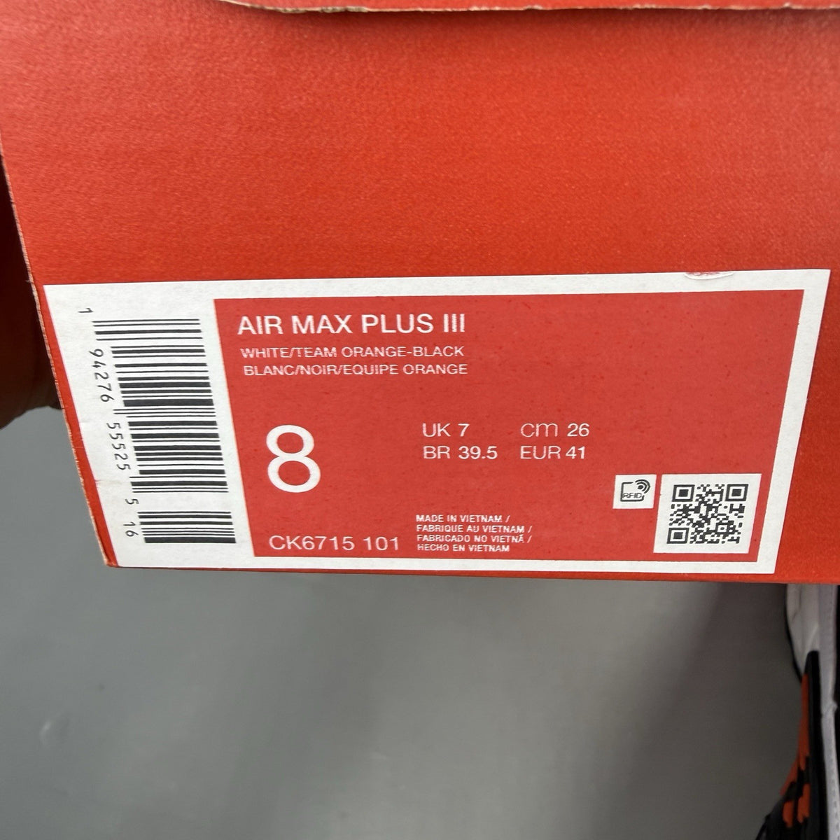 Nike Air Max Plus TN 3 white trainers with black and team orange accents, logo detail.
